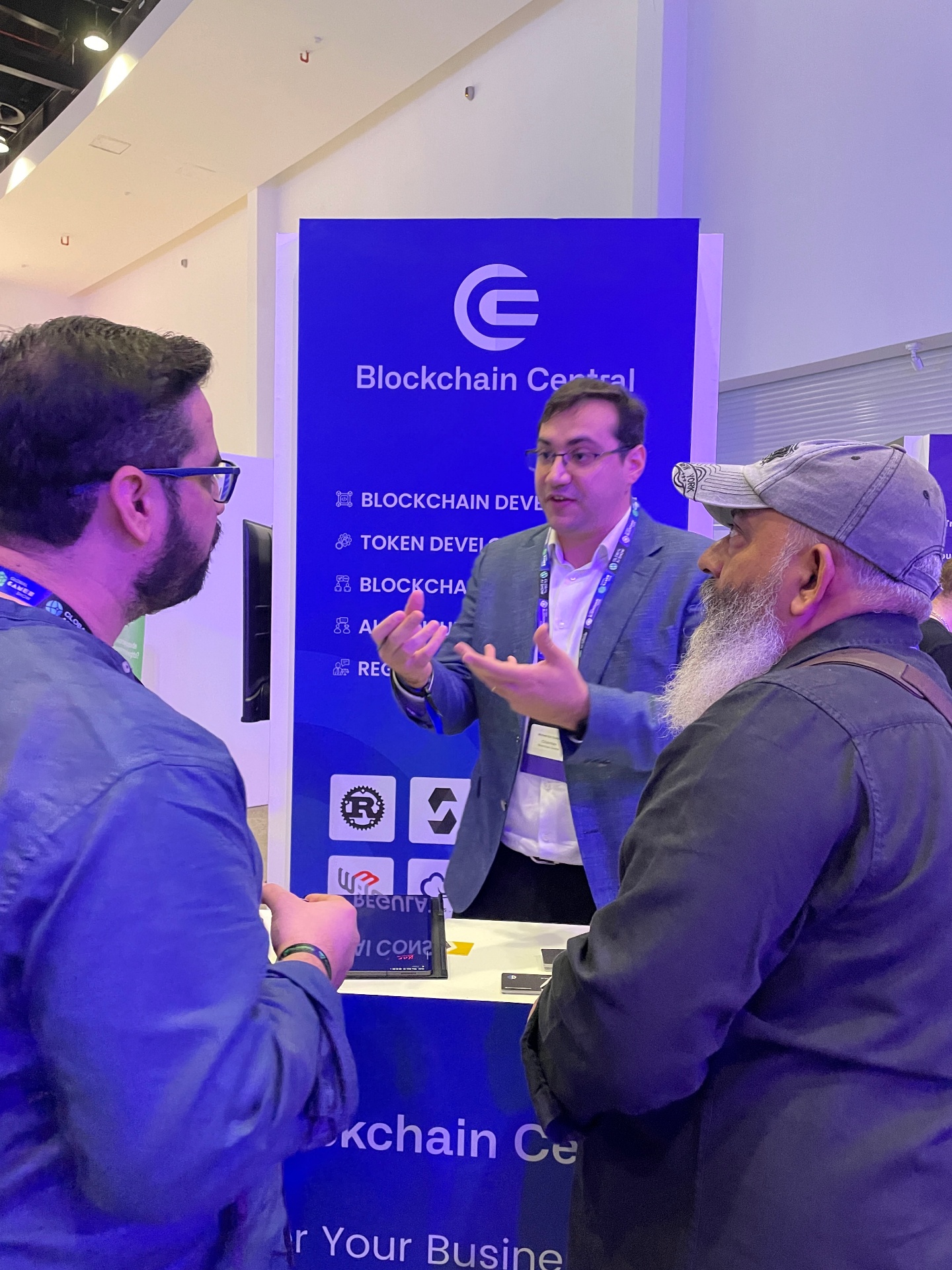 Blockchain Central booth with visitors at a conference